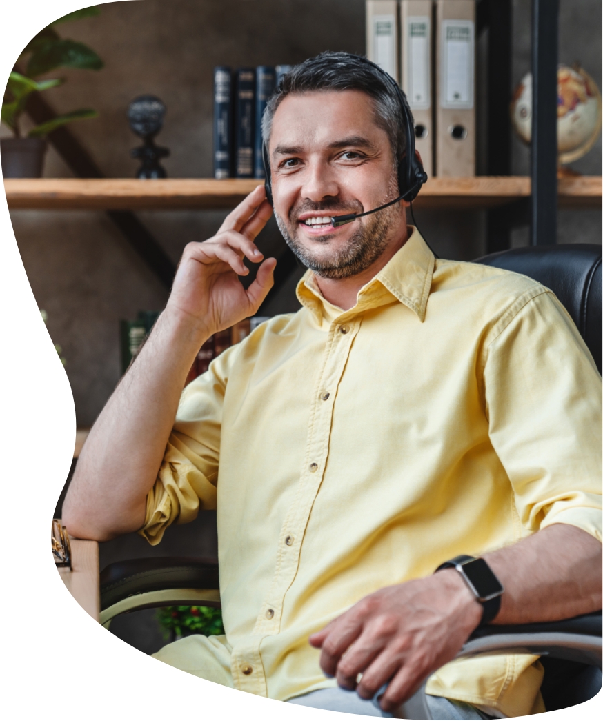 Man talking on headset smiling